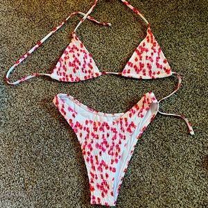 Brand new SHEIN swim suit for sale. White with pink flowers.